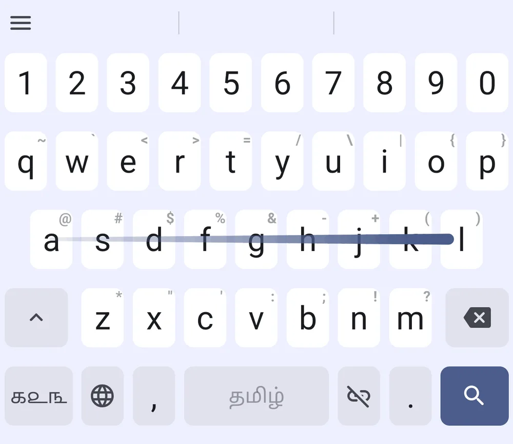 A swipe trail across the Tamil transliteration keyboard